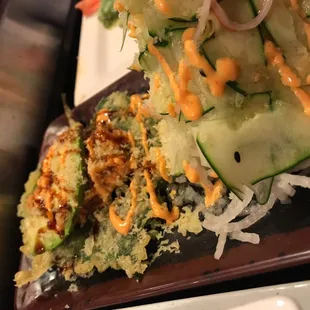 fried sesame leaf avocado crab mix and cucumber salad!