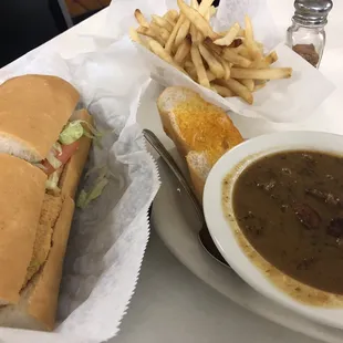 Fish poboy, cuppa gumbo, and fries free with check in!
