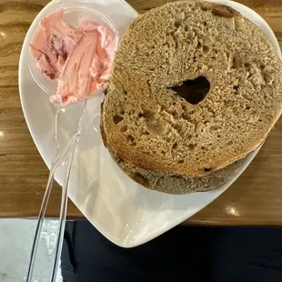 Cinnamon and raising bagel with strawberry cream cheese!