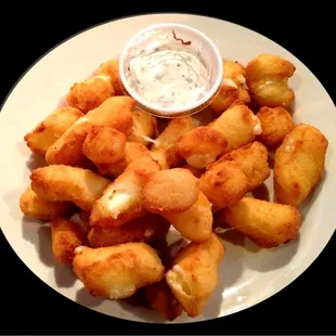 Fried cheese curds, I'll never go back to mozzarella sticks again.