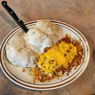 Country eggs Benedict with cheesy hash browns