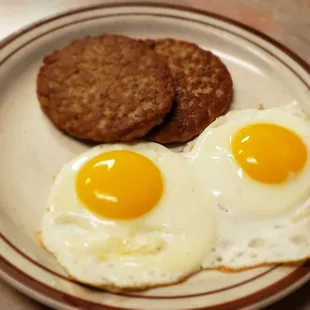 two fried eggs on a plate