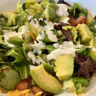 Avocado added to a side salad