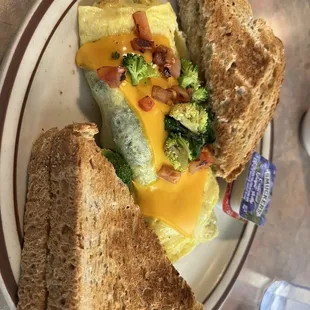 Garden veggie omelette with homemade wheat toast.