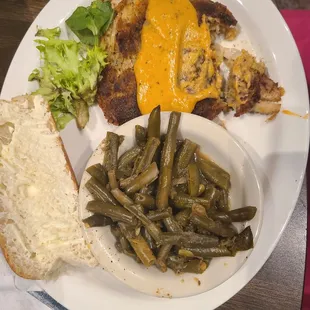 Crab cake stuffed flounder, green beans, bread.