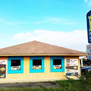 a blue and yellow building