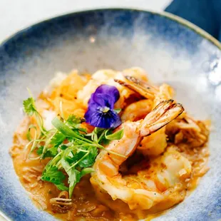 Prawn satay - grilled marinated prawns with sweet and spicy peanut and mung bean sauce , serve with rice vermicelli, shallot, veggie relish