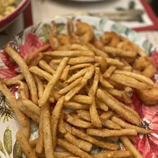 seasoned fries and colossal shrimp in the background