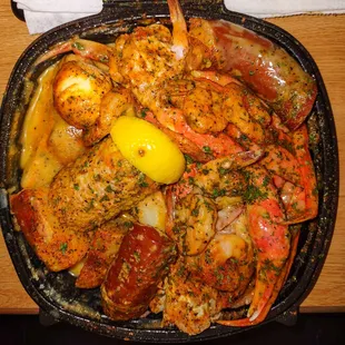 Seafood boil. In super thick butter sauce. It wasn't good at all. Too greasy. Too heavy. Flavorless.