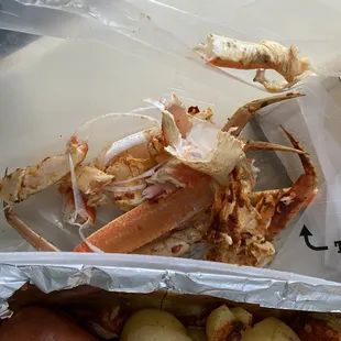 crab legs and potatoes
