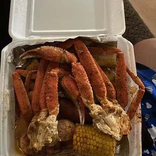 crab legs and corn on the cob