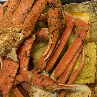 3 crab clusters in lemon butter, and Cajun. Sausage, egg and potatoes.