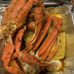 3 crab clusters in lemon butter, and Cajun. Sausage, egg and potatoes.