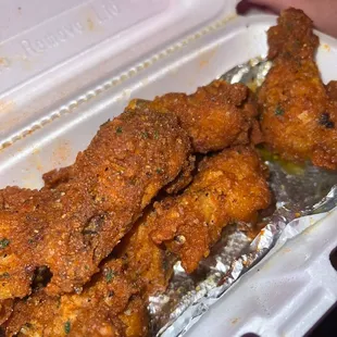 fried chicken in a styrofoam container