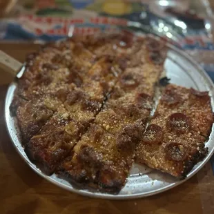 Half pepperoni half sausage pizza (Can't forget the caramelized cheese crust)