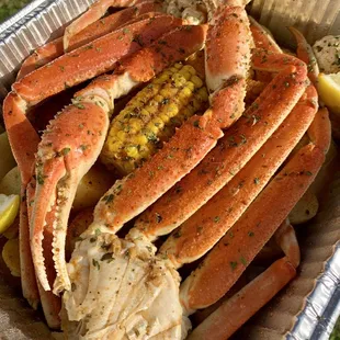 @roxysgoodeats Ragin Cajun Leglicious ~ 2 clusters of snow crab, whole sausage, egg, corn, on a bed of gold potatoes