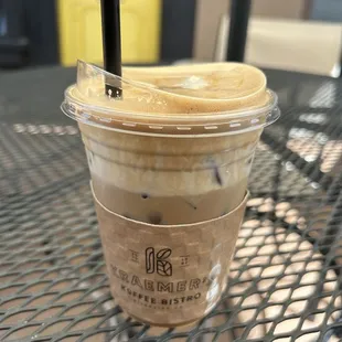 a cup of coffee on a table