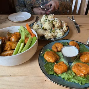 Wings and roasted cauliflower and buffalo shrimp
