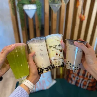 Signature milk tea, regular (100%) sweetness, black boba (far right)