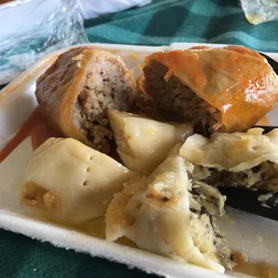 Stuffed cabbage, mushroom/sauerkraut pierogis and potato/cheese pierogis.
