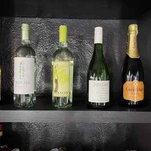 bottles of wine on a shelf
