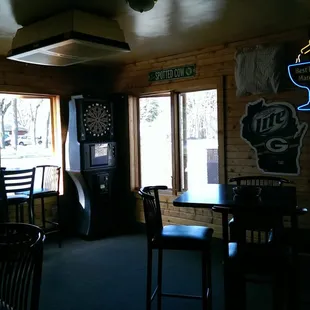 a bar with a clock on the wall