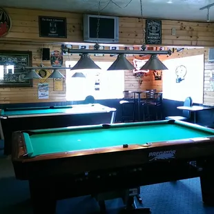 a pool table and a bar
