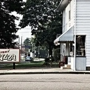  street corner with a sign in the foreground