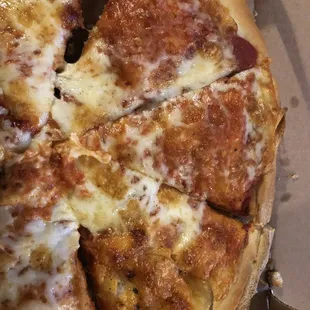 a slice of pizza in a box