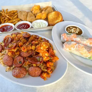 k&apos;asian style fried rice, vietnames spring rolls, fried fish and fried shrimp basket