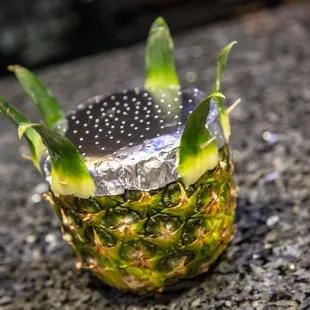 a pineapple on the counter