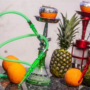 a variety of fruit and a hookah
