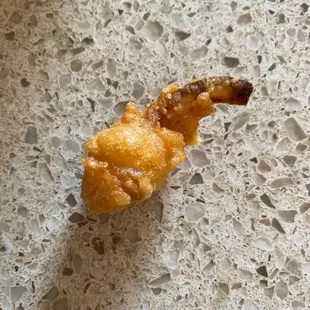 Cheese curd with a side of onion ring.