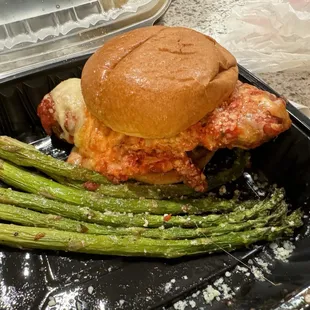 Chicken parm sandwich with asparagus