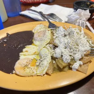 Chilaquiles, watered down beans, paid extra for second egg, small portion 5/10