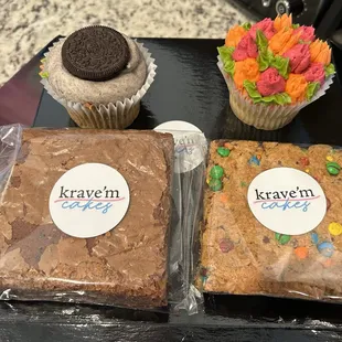 Oreo cupcake, vanilla cupcake, giant brownie, and giant M&amp;M cookie