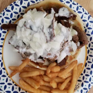 Order to go - Gyro smothered with tzatziki, that&apos;s how I like it.