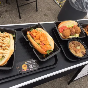 hree trays of food on a table