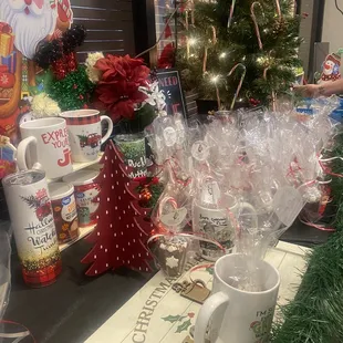 a table with a christmas tree in the background