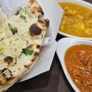 Garlic naan, chicken tikka masala, Shahi paneer