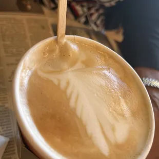 Latte w/ a cute design from Brandon (design looked better before my mom stirred it!)