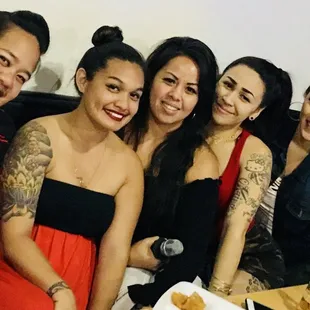 a group of women posing for a picture