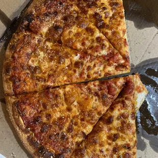 Burnt rubbery greasy cheese pizza, yum.