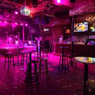 a bar with purple lighting