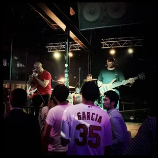 a band performing on stage
