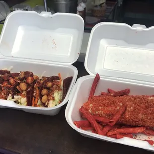 two takeout containers of food