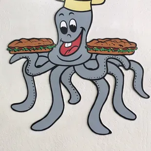 an octopus holding a sandwich