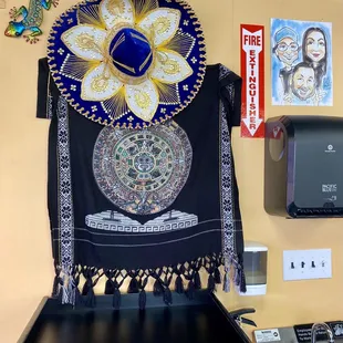 a table with a black table cloth and a blue table cloth