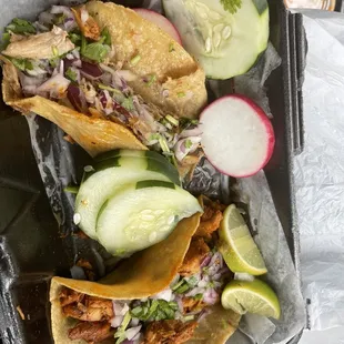 Carnitas and pollo tacos