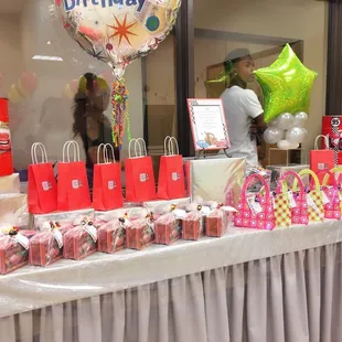 KKP pe-wrapped party favor for boys and girls. I also gave my own party flavor bag (in red)full of treats!!